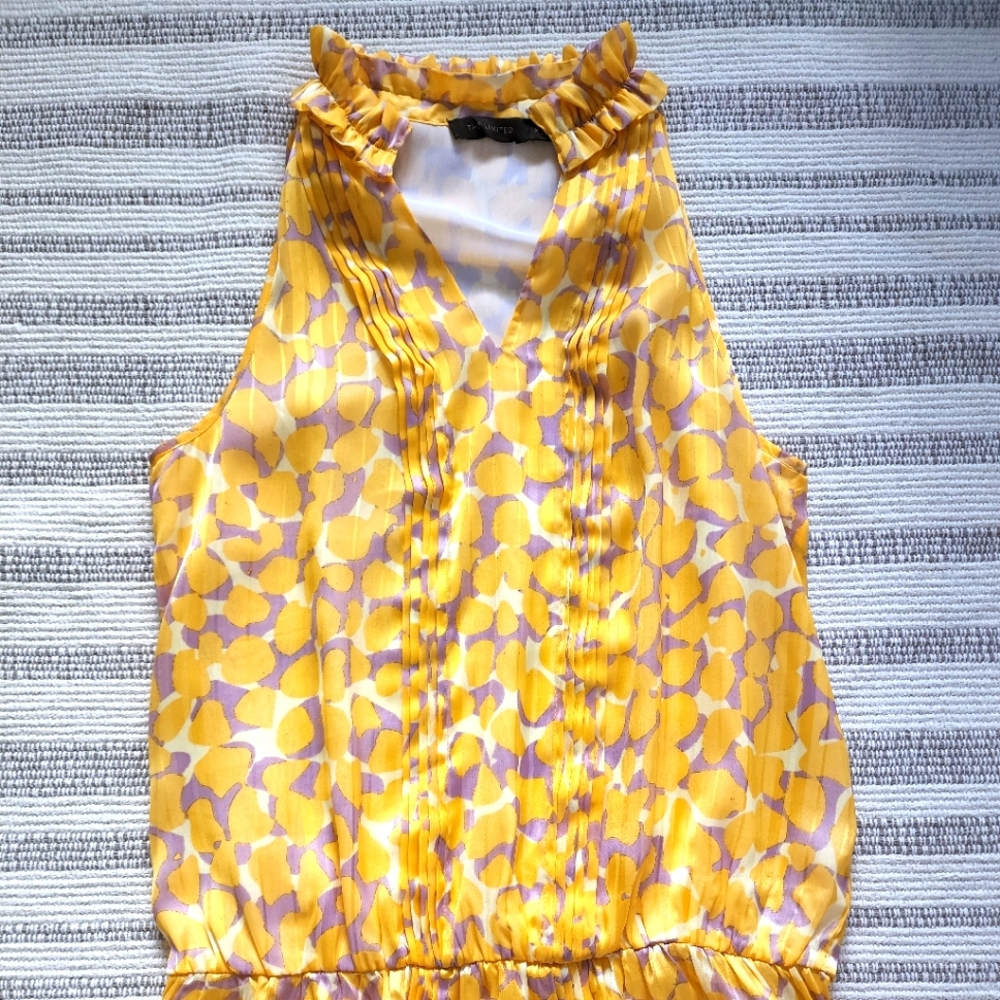 Ruffle V neck blouse.